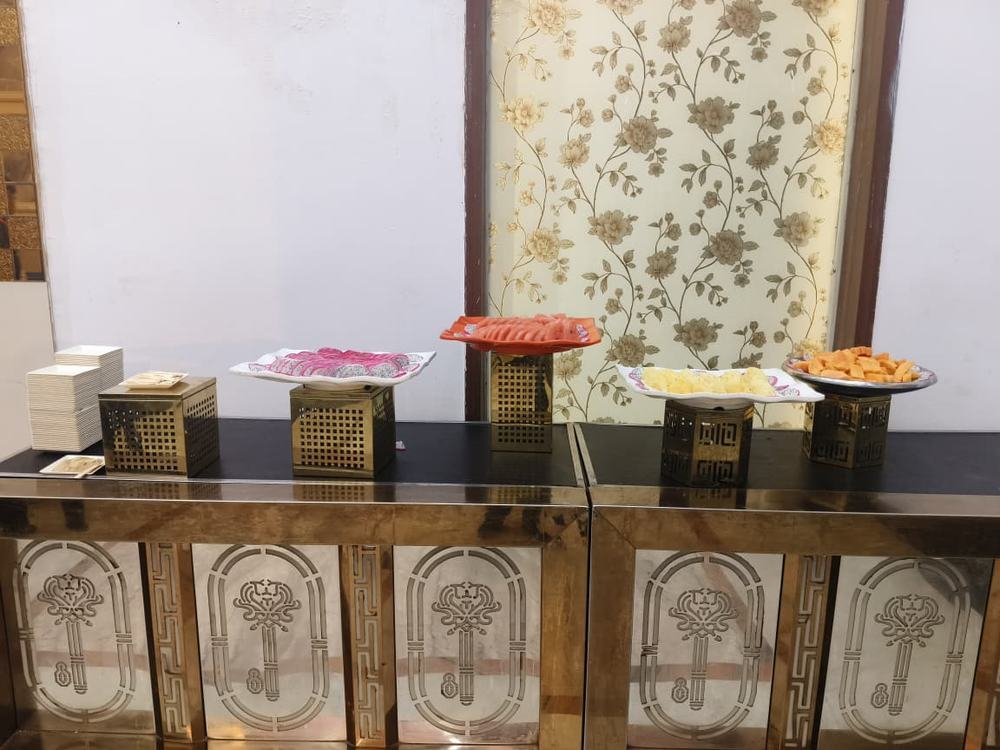 Fruit counter styled on brass stands